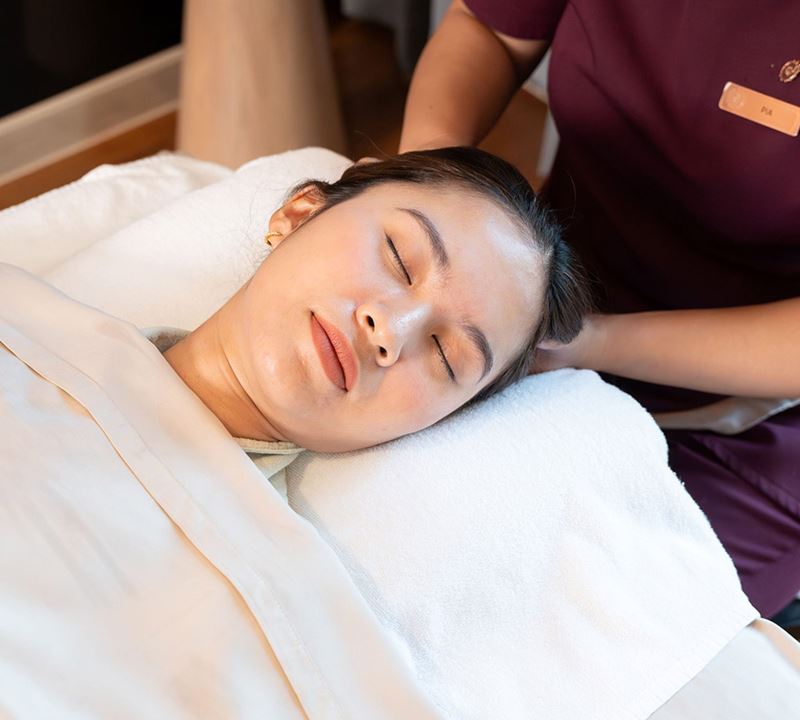 Beautiful woman getting face massage